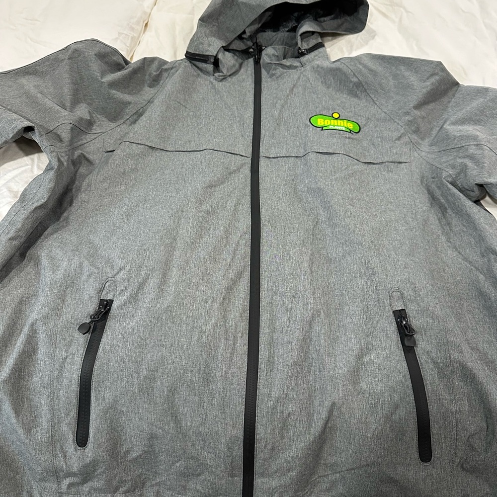 Bonnie Plants rain coat. New with tags. Never worn.